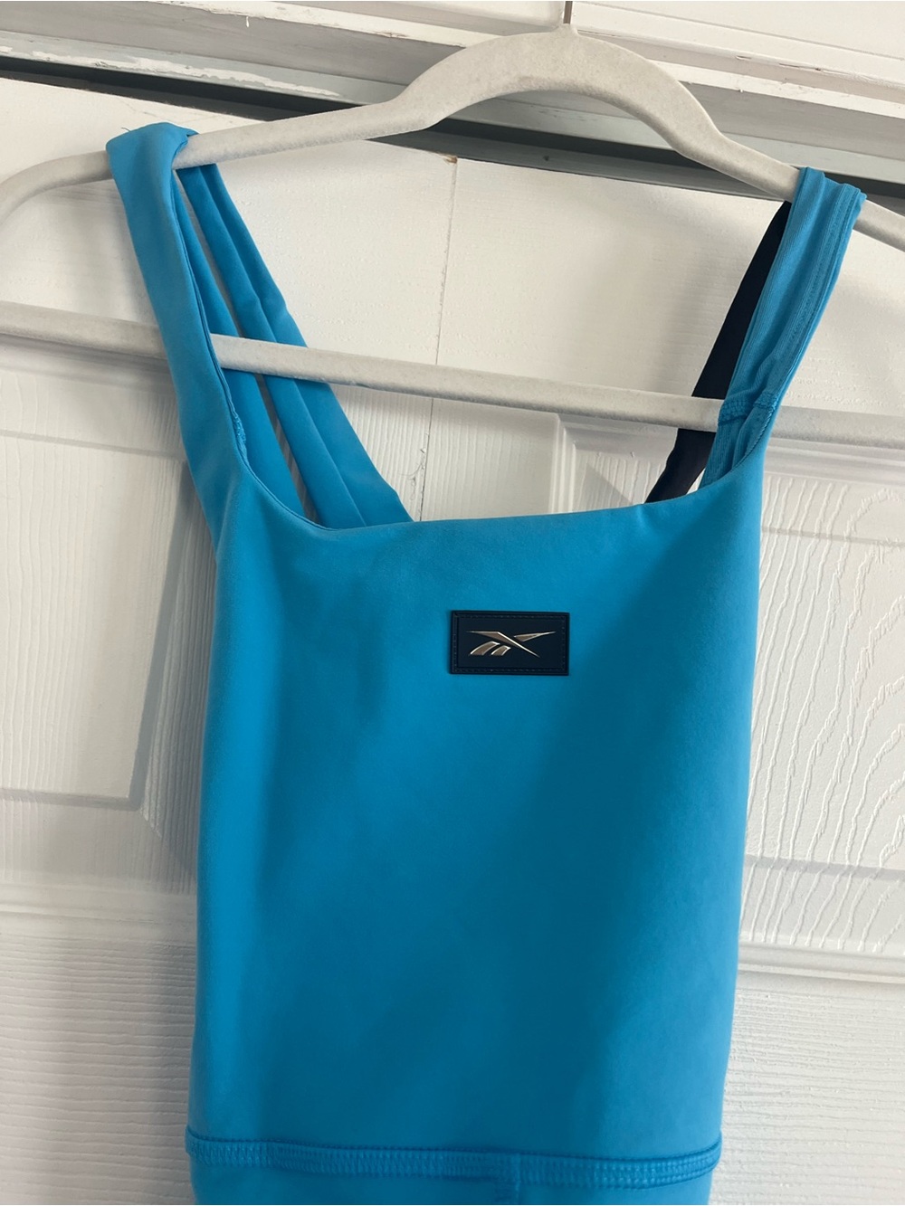 Reebok Bright Turquoise One-Piece Bodysuit